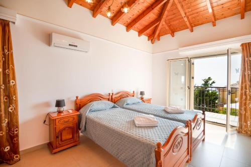 Кровать или кровати в номере Villa Allegra