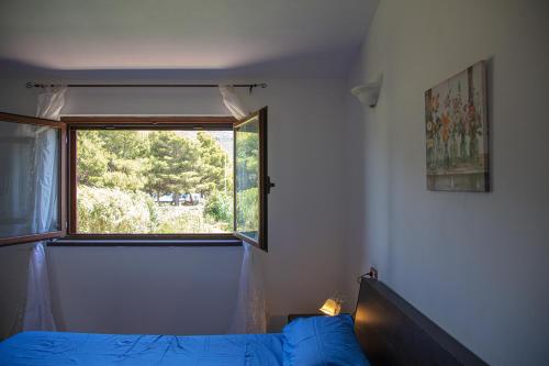 Postel nebo postele na pokoji v ubytování BIG RIVER HOUSE, Fronte Temo