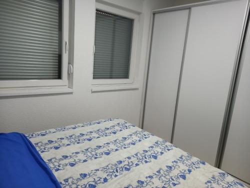Ένα ή περισσότερα κρεβάτια σε δωμάτιο στο Stan Živinice bb