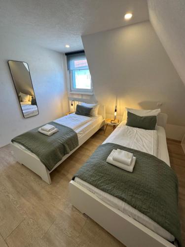 Ένα ή περισσότερα κρεβάτια σε δωμάτιο στο Sali Homes- Penthouse