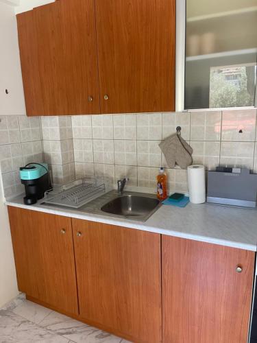 Η κουζίνα ή μικρή κουζίνα στο Alas Apartment