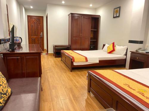 Postel nebo postele na pokoji v ubytování DONA hotel