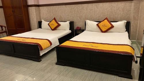 Postel nebo postele na pokoji v ubytování DONA hotel