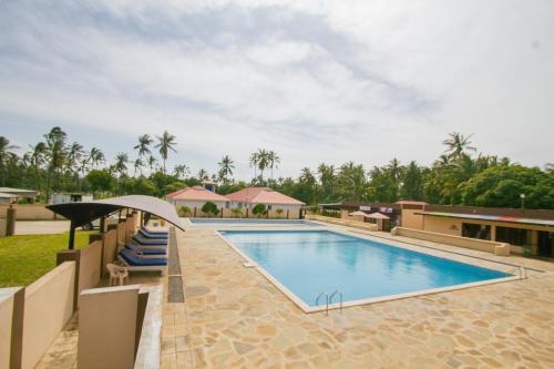 an image of a swimming pool at a resort at Havillah Gardens Watamu in Watamu