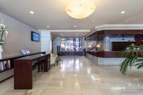 O saguão ou recepção de Hotel Anabel