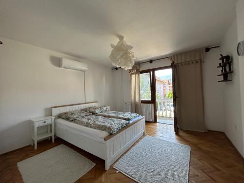 Una cama o camas en una habitación de domus est alba
