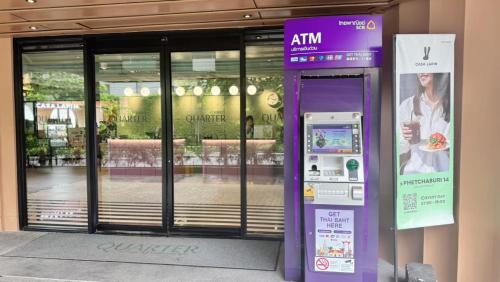 a vending machine in front of a store at The Quarter Ratchathewi by UHG in Bangkok