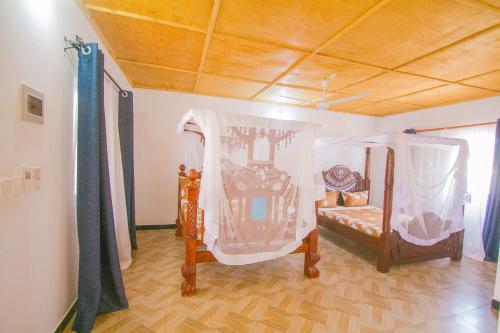 Ένα μπάνιο στο Havillah Gardens Watamu