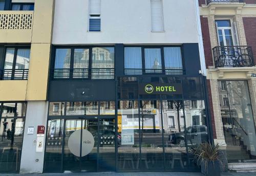 a hotel sign on the side of a building at B&B HOTEL Le Havre Centre in Le Havre