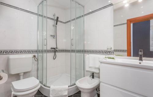 a bathroom with a toilet and a shower and a sink at Villa Palace Clara Apartment 6 island Krk by Villa in Malinska