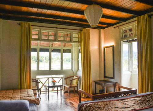 Posezení v ubytování Gregory's Bungalow