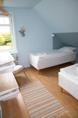 Cama o camas de una habitación en Stub Inn Guesthouse