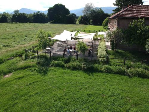 an aerial view of a farm with tents in a field at La Locanda della Mandria in Venaria Reale