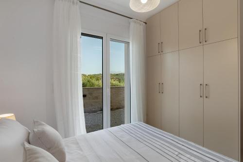 Кровать или кровати в номере Villa Terra Nuova