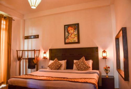 Ένα ή περισσότερα κρεβάτια σε δωμάτιο στο Gregory's Bungalow