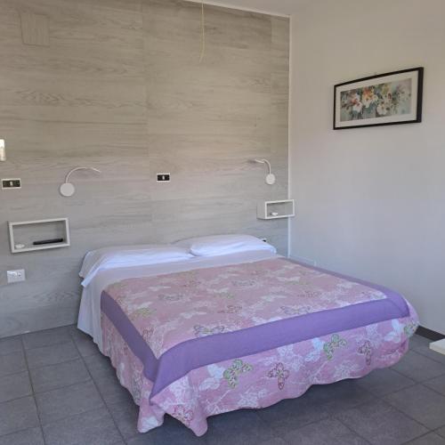 Ένα ή περισσότερα κρεβάτια σε δωμάτιο στο Residence Castiglione