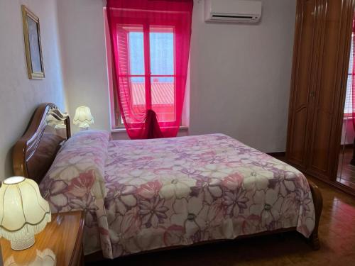 Postel nebo postele na pokoji v ubytování Agriturismo La Carlina