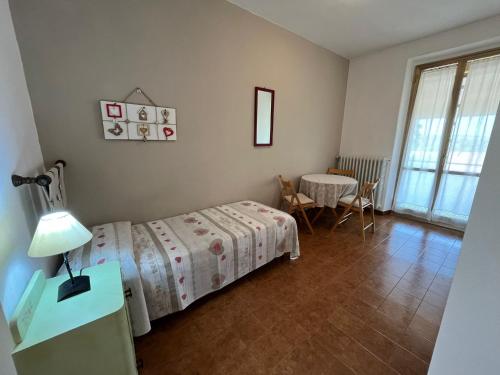 Postel nebo postele na pokoji v ubytování Agriturismo La Carlina