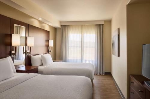 Ένα ή περισσότερα κρεβάτια σε δωμάτιο στο Residence Inn Prescott