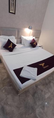 Postel nebo postele na pokoji v ubytování Hotel Prithvi By Admire Stays