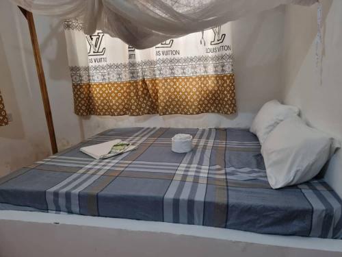 Postel nebo postele na pokoji v ubytování Shalom Homestay