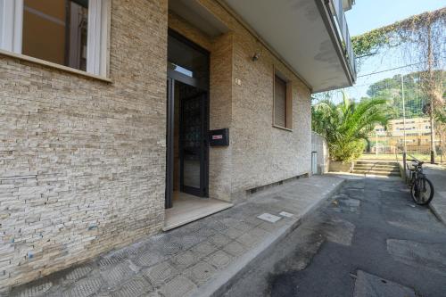 a door to a building with a bike parked outside at 320 - Casa Scorcio di Mare A due passi dal centro e dal mare di Riva Trigoso in Riva Trigoso