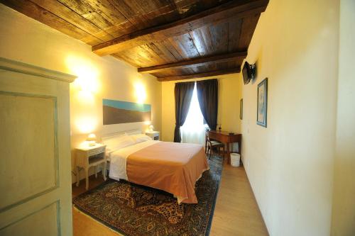 Katil atau katil-katil dalam bilik di Hotel Il Campanile