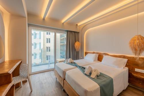 Postel nebo postele na pokoji v ubytování Arte Hotel