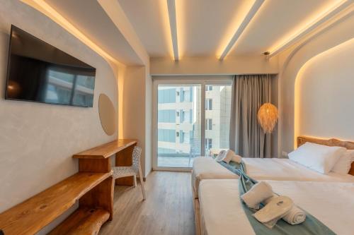 TV a/nebo společenská místnost v ubytování Arte Hotel