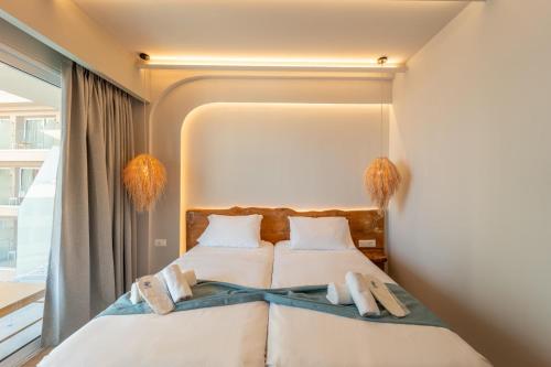 Postel nebo postele na pokoji v ubytování Arte Hotel
