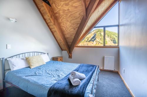 Postel nebo postele na pokoji v ubytování Mt Lyford Lodge