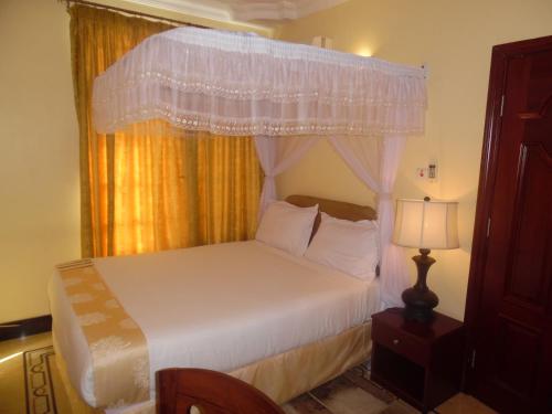 Cama o camas de una habitación en Lantana Hotel
