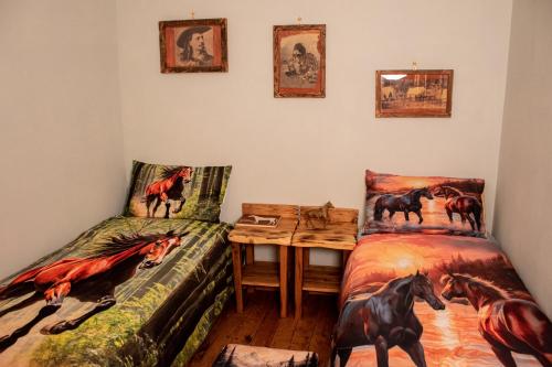 Postel nebo postele na pokoji v ubytování Il Ranch Country House B&B