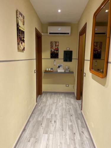 a corridor of a room with a hallway at B&B Garzola in Ossuccio