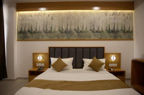 Hotel The Grand Shivaにあるベッド