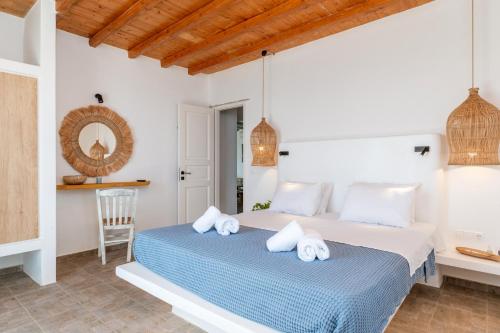 Katil atau katil-katil dalam bilik di Allegro Country House Tinos