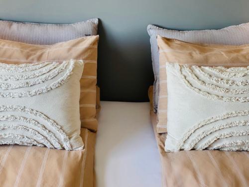 Una cama o camas en una habitación de Lindarhóll Guesthouse