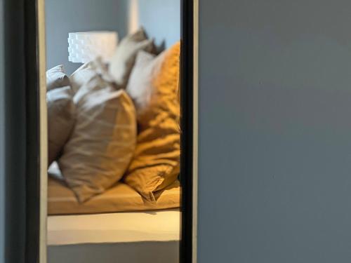 Una cama o camas en una habitación de Lindarhóll Guesthouse