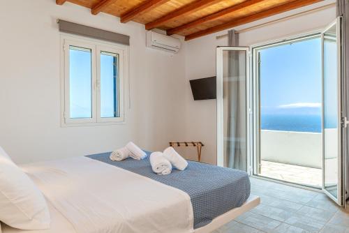 Katil atau katil-katil dalam bilik di Allegro Country House Tinos