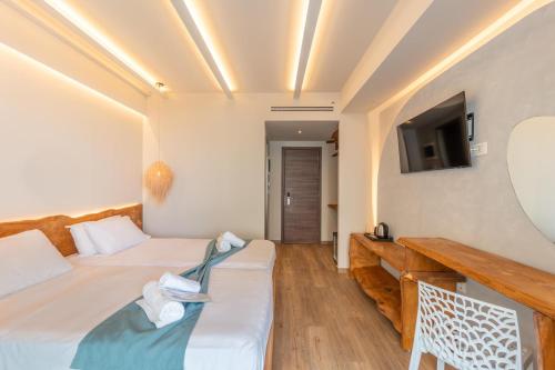 Postel nebo postele na pokoji v ubytování Arte Hotel