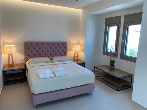 Postel nebo postele na pokoji v ubytování Luminous Luxury Apartments