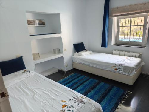 Katil atau katil-katil dalam bilik di Casa Limón - Alpujarras