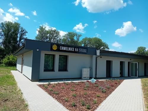 a building with a sign that reads changeamine ma state at Chmelnice na stezce in Napajedla