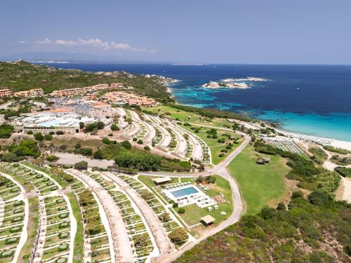 an aerial view of a resort near the ocean at Mangia's Sardinia Resort - NEW OPENING in Santa Teresa Gallura