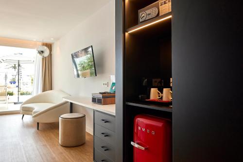 Η κουζίνα ή μικρή κουζίνα στο Universal Hotel Neptuno - Adults Only