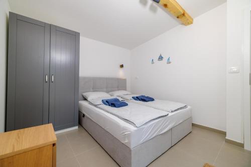 En eller flere senge i et værelse på Blue Adria Pearl House