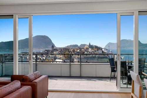 a living room with a view of the water at Scandic Parken in Ålesund