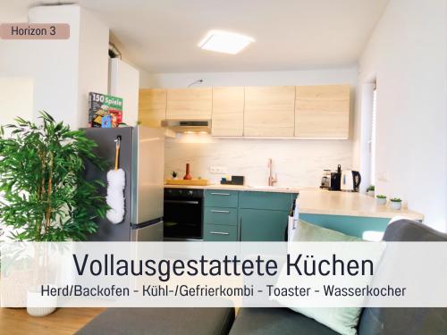 Η κουζίνα ή μικρή κουζίνα στο Newman Horizon Apartments Zirndorf - Playmobil Funpark, Nähe Messe Nürnberg und Fürth, 4 Pers, 24h Self Checkin, Waschmaschine, großer Parkplatz