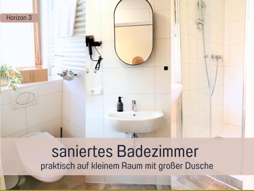 Ένα μπάνιο στο Newman Horizon Apartments Zirndorf - Playmobil Funpark, Nähe Messe Nürnberg und Fürth, 4 Pers, 24h Self Checkin, Waschmaschine, großer Parkplatz