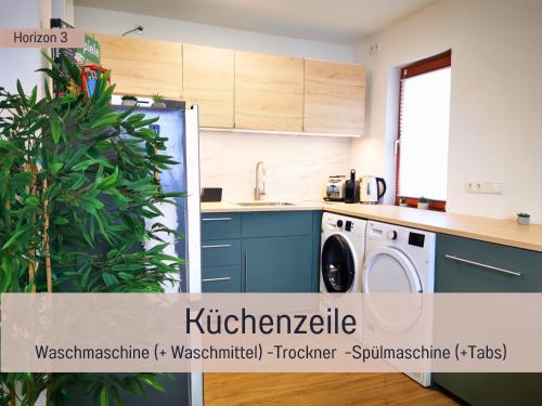 Η κουζίνα ή μικρή κουζίνα στο Newman Horizon Apartments Zirndorf - Playmobil Funpark, Nähe Messe Nürnberg und Fürth, 4 Pers, 24h Self Checkin, Waschmaschine, großer Parkplatz